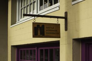 Sign for SMC reading "Seattle Messenger Cooperative"